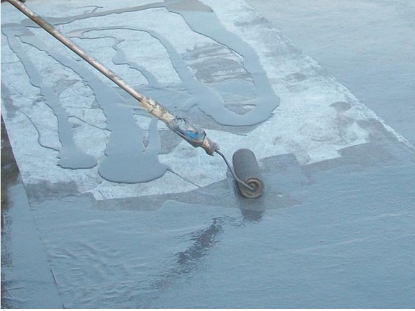Applying Impermax Cold Polyurea with a roller.